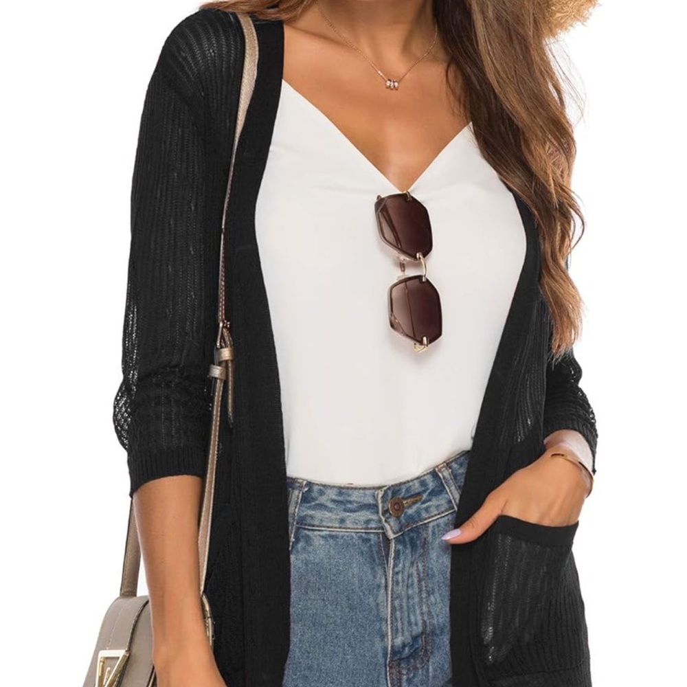 Black cardigan, size large new with tags